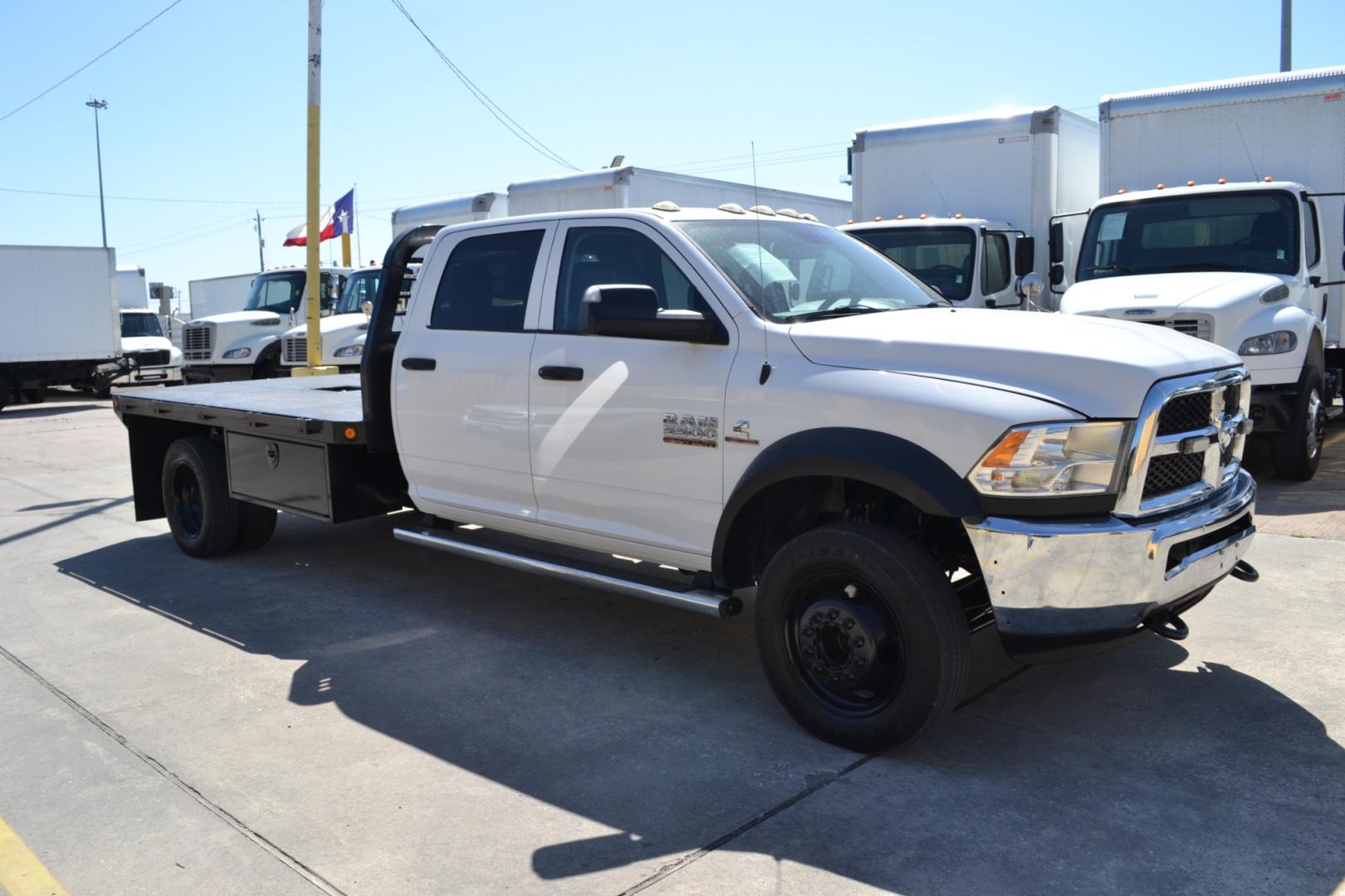 2016 WHITE /BLACK RAM 5500 with an CUMMINS 6.7L TURBO DIESEL engine, AISIN A465 6SPD AUTOMATIC transmission, located at 9172 North Fwy, Houston, TX, 77037, (713) 910-6868, 29.887470, -95.411903 - 19,500LB GVWR, 11.5FT FLATBED, 96" WIDE, GOOSENECK/BUMPER PULL HITCH, CREW CAB, POWER WINDOWS, LOCKS, & MIRRORS, COLD A/C - Photo#2